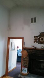 Wall above fireplace gets black soot. How to prevent?