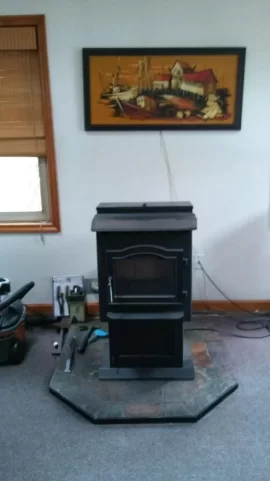 [Hearth.com] Wall above fireplace gets black soot. How to prevent?