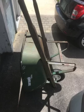 [Hearth.com] This old wheelbarrow with a bad non standard wheel - using a pellet stove auger set collar to fix!