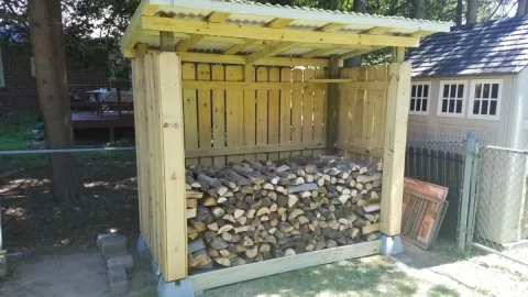 [Hearth.com] Wood shed built using board on board fencing