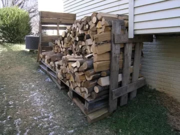 [Hearth.com] I just bought a cord of wood, but it's damp and hisses when I burn it. What can I do?