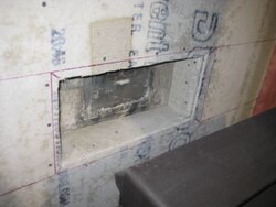 [Hearth.com] pipe in enclosed, non combustible wall, ok with combustible wall attached?