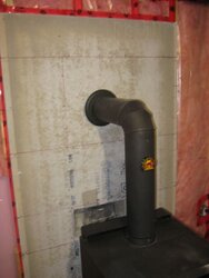 [Hearth.com] pipe in enclosed, non combustible wall, ok with combustible wall attached?