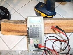 Using a multimeter to measure wood moisture level