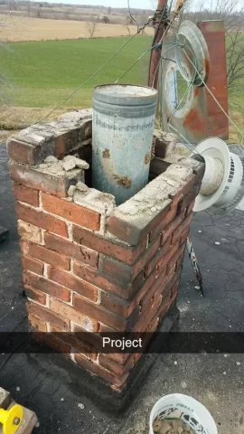 [Hearth.com] 7" galvanized liner in chimney. Remove or keep it?