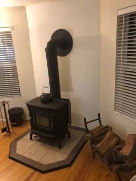 [Hearth.com] Draft Inducer, wind cap, or extend chimney?