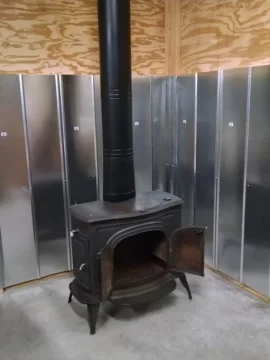 [Hearth.com] Wall shield install for Defiant in garage