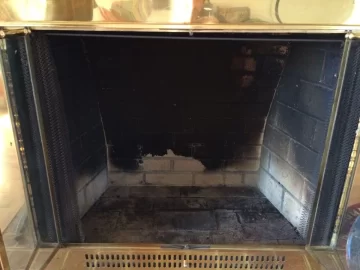 [Hearth.com] Wood stove inside fireplace?