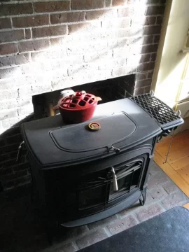 [Hearth.com] some smoke from cat stove on rainy/mild day - is this OK?