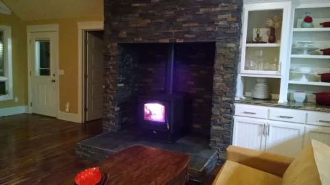 [Hearth.com] Any way to use a free standing stove in this situation?