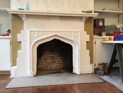 Question about 1940s fireplace surround material