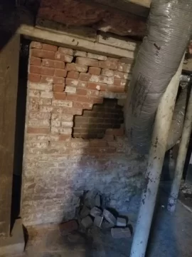 [Hearth.com] Crumbling brick chimney stack in 120 year old home