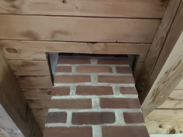 [Hearth.com] Trimming around exposed brick chimney