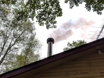 [Hearth.com] Smoke from chimney WITH hot fire??