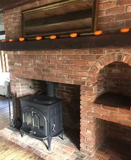 [Hearth.com] wood stove inside fireplace???