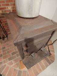 Top of Nashua stove is rusted and pitted
