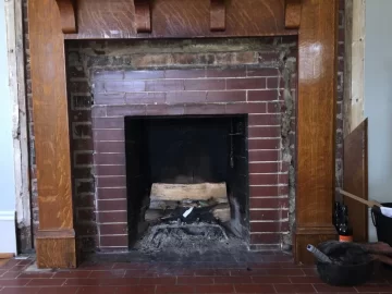 [Hearth.com] Liner and cap on a 100 year old Chimney with rectangular flue