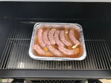 [Hearth.com] Amber beer Brats on a new GMG prime DBSSWF pellet grill 250 Deg F for a 3 hour smoke.