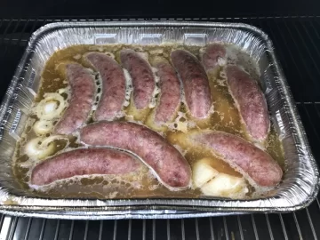 [Hearth.com] Amber beer Brats on a new GMG prime DBSSWF pellet grill 250 Deg F for a 3 hour smoke.