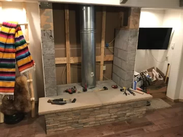 [Hearth.com] Large open sided concrete fireplace help