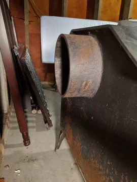 [Hearth.com] Proper Method for Stove Pipe on rear-vent basement burner