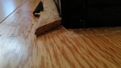 [Hearth.com] Granite hearth damaged by lack of floorboard expansion gap