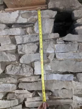 [Hearth.com] Passing through stone chimney