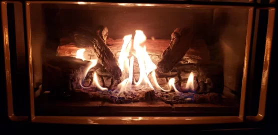 [Hearth.com] Should my flames be dancing around so much? Restrictor needs adjustment?