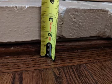 [Hearth.com] Floor protection needs to be level with hearth? (Drolet 1800i insert)