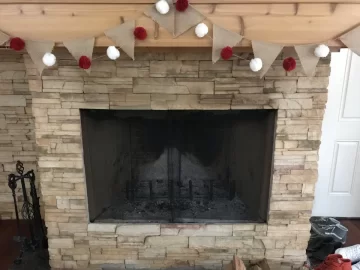 [Hearth.com] Standing wood stove in prefab fireplace