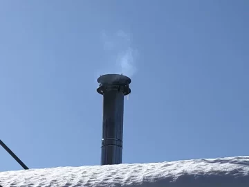 [Hearth.com] Chimney dripping brown stuff on new metal roof - concerned of damage and root cause