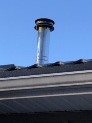 Chimney dripping brown stuff on new metal roof - concerned of damage and root cause