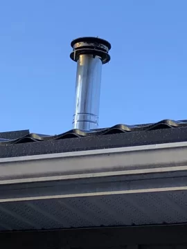 [Hearth.com] Chimney dripping brown stuff on new metal roof - concerned of damage and root cause