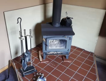 [Hearth.com] wall covering behind woodstove