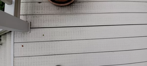 [Hearth.com] Can anyone identify this composite/alternative decking?