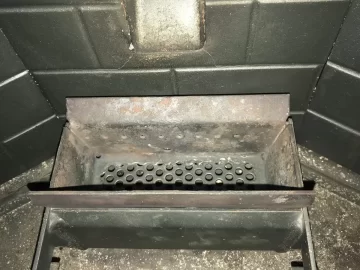 [Hearth.com] Hole in Enviro steel burnpot, buy a new one or upgrade the bottom?