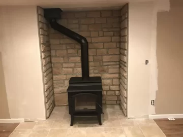 [Hearth.com] Replaced prefab fireplace and insert with free standing stove