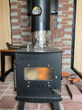 [Hearth.com] New Stove: leak smokes