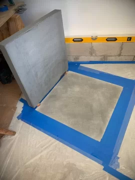 [Hearth.com] Bedding large slab of bluestone to concrete for woodstove platform