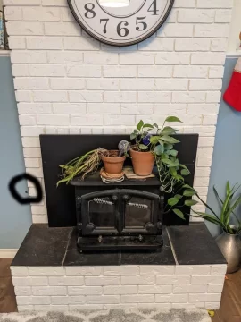 [Hearth.com] Just moved in. Should I get this old stove working again? Convert back to traditional fireplace?