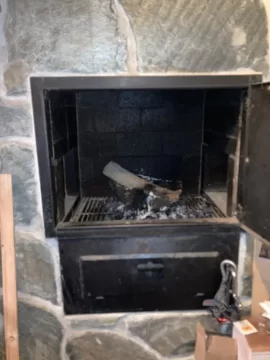 [Hearth.com] Adding a small wood stove to a 1970s brick chimney that has a capped hole and platform for stove