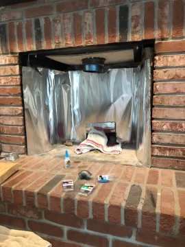 [Hearth.com] Wood Stove - Heat output in fireplace fire box versus out front on hearth