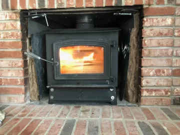 [Hearth.com] Wood Stove - Heat output in fireplace fire box versus out front on hearth