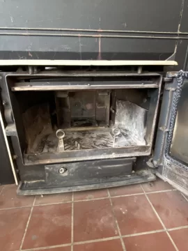 [Hearth.com] Metal sticking out inside back of stove