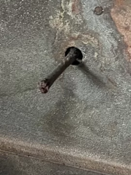 [Hearth.com] Metal sticking out inside back of stove