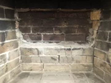 [Hearth.com] Insert just a little too deep for the upper part of the fireplace?