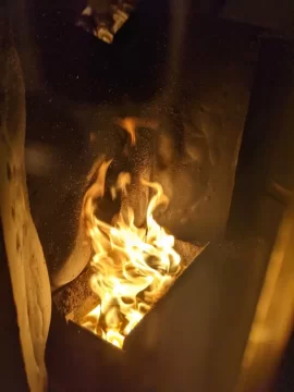 [Hearth.com] Why flames are hugging the back of the pellet stove?