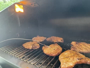 [Hearth.com] GMG Green Mountain Grills Smoked Iowa Bone In 1” Thick Iowa Pork Chops with Texas Blend wood pellets on the Daniel Boone Prime Plus.