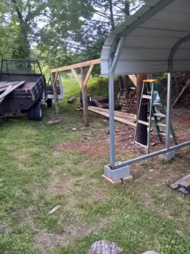 [Hearth.com] Economical wood shed with power poles