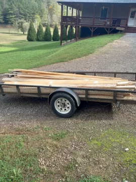 [Hearth.com] Economical wood shed with power poles